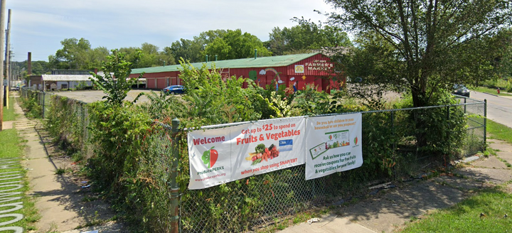 Farmers Market on Corner of road.